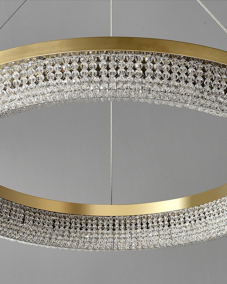 Cyrereon rund kristallampa i guld med LED