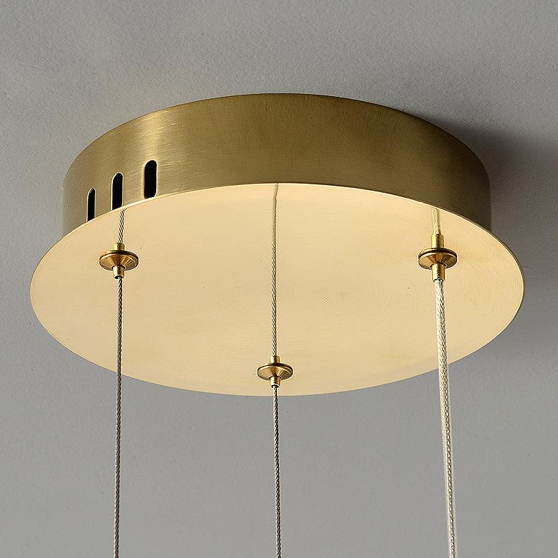Cyrereon rund kristallampa i guld med LED