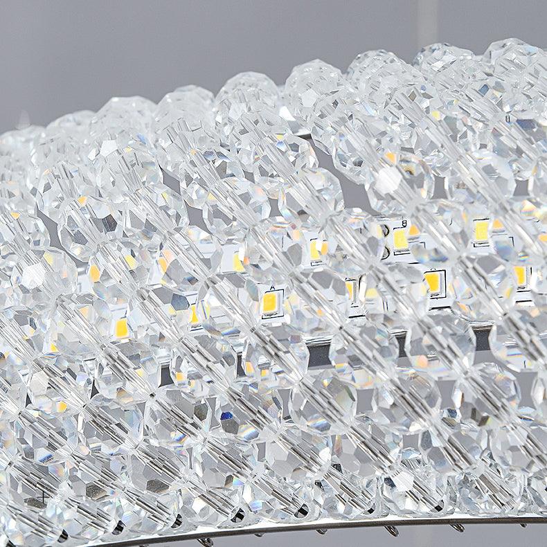 Cyrereon rund kristallampa i guld med LED