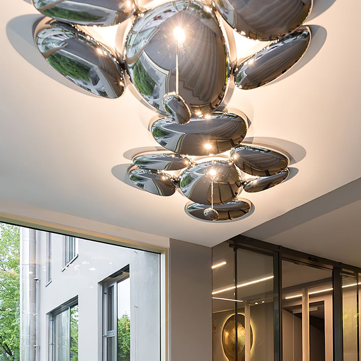 Vostix modern taklampa i krom med småstensdesign