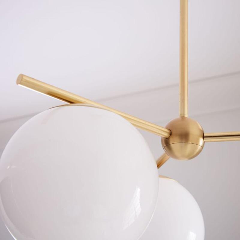 Casoella moderne Sphere & Stem-lysekrone i guldfarve med LED