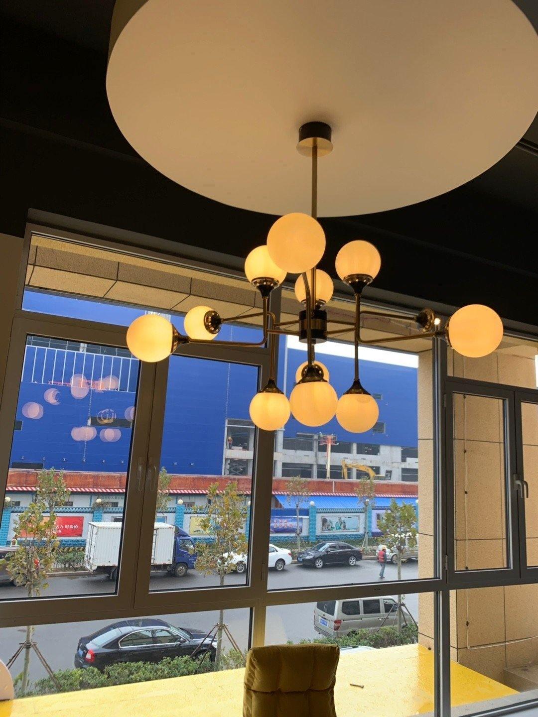 Candeeiro de lustre Stilnovo de latão e vidro preto Wasgt