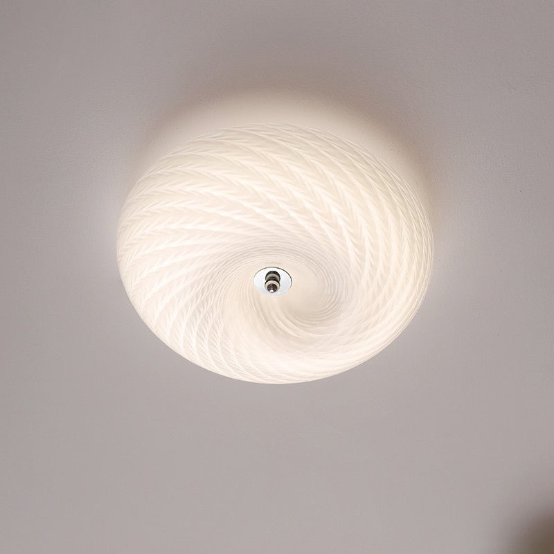 Virvelformad plafond i glas