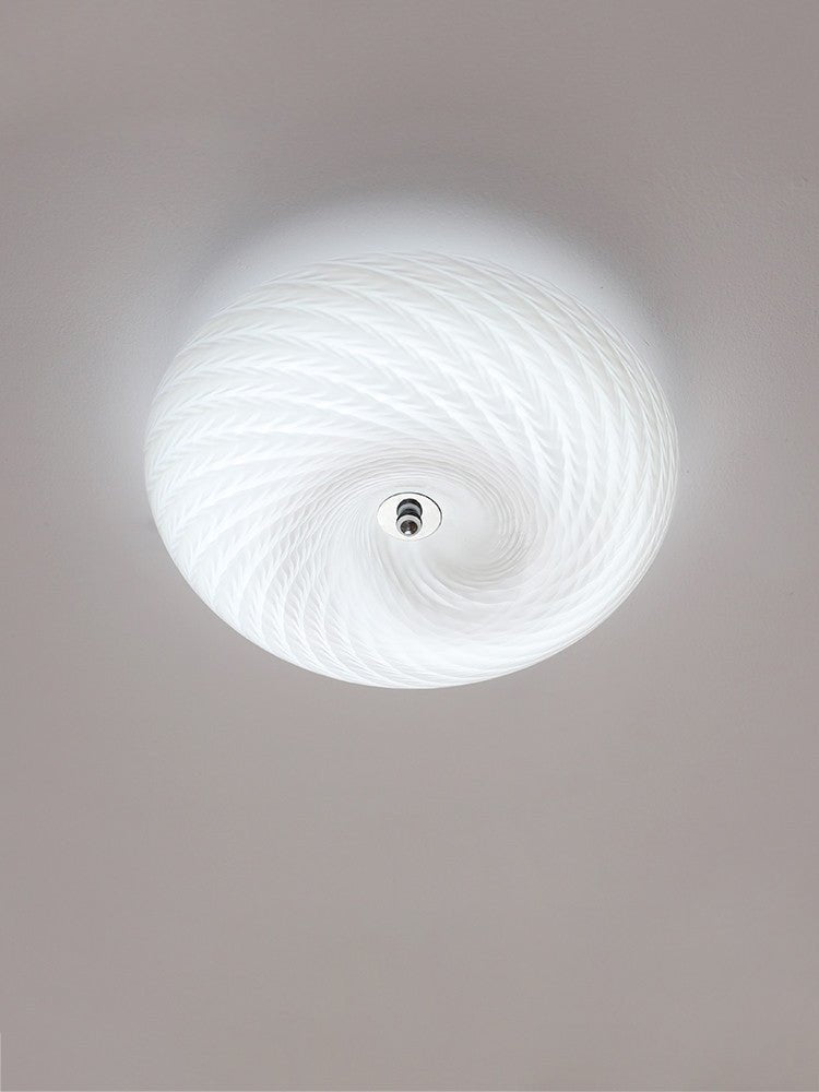 Virvelformad plafond i glas