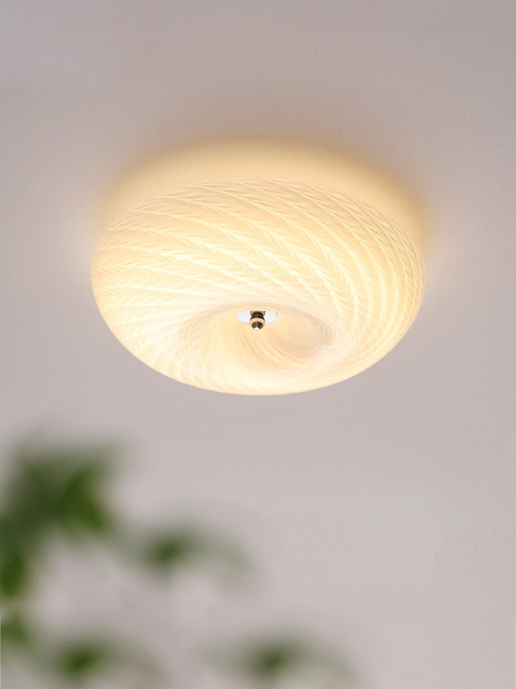 Virvelformad plafond i glas