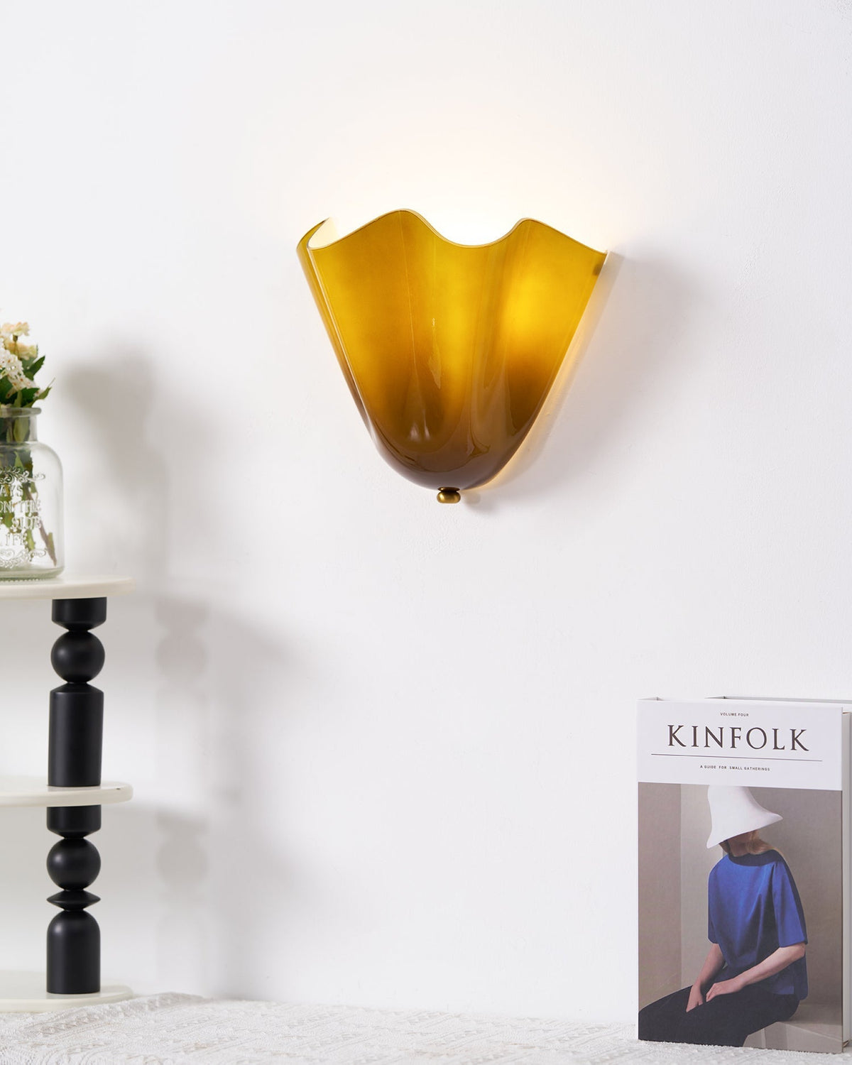 Renenielle vägglampa med mjuka kurvor