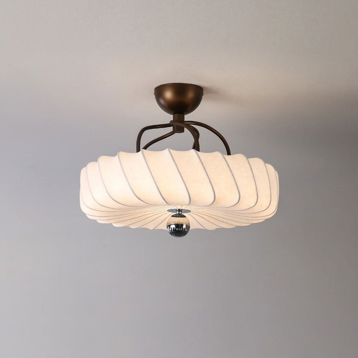 Zelore pendellampe med hvirveldesign i stof og bronze