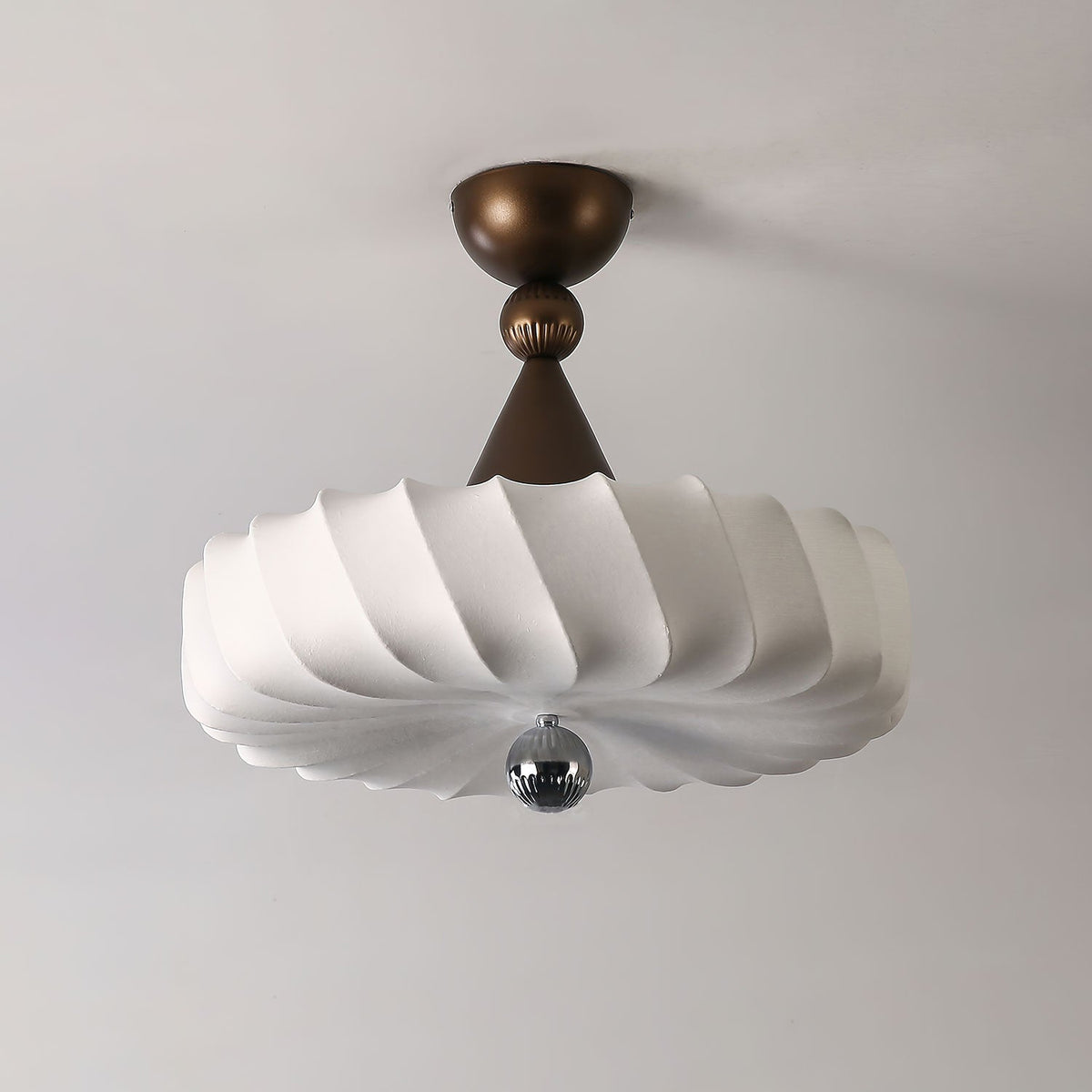 Zelore pendellampe med hvirveldesign i stof og bronze