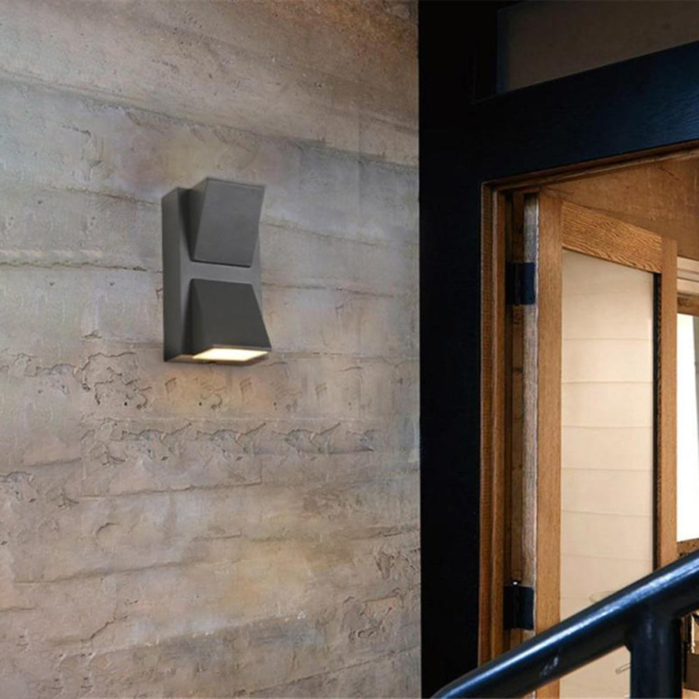 Vexto moderne sort LED-væglampe i metal til udendørs brug
