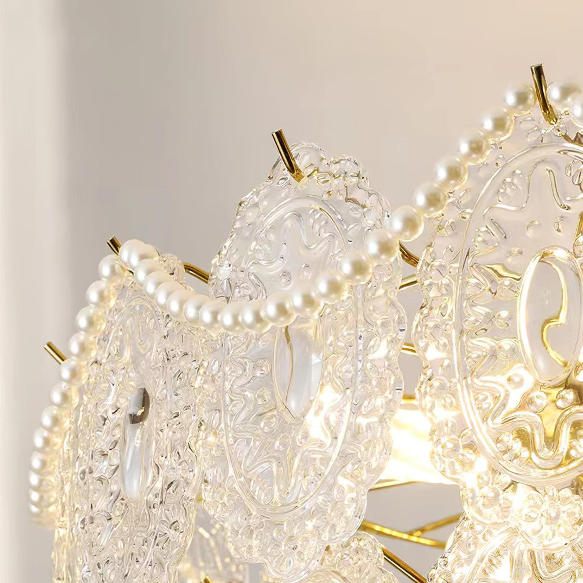 Orieleon modern vågformad ljuskrona i guld med pärlor