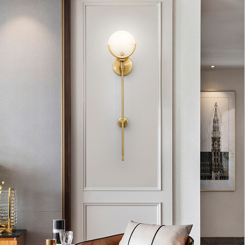 Valentina modern LED-vägglampa i metall/dolomit, kulformad, guld