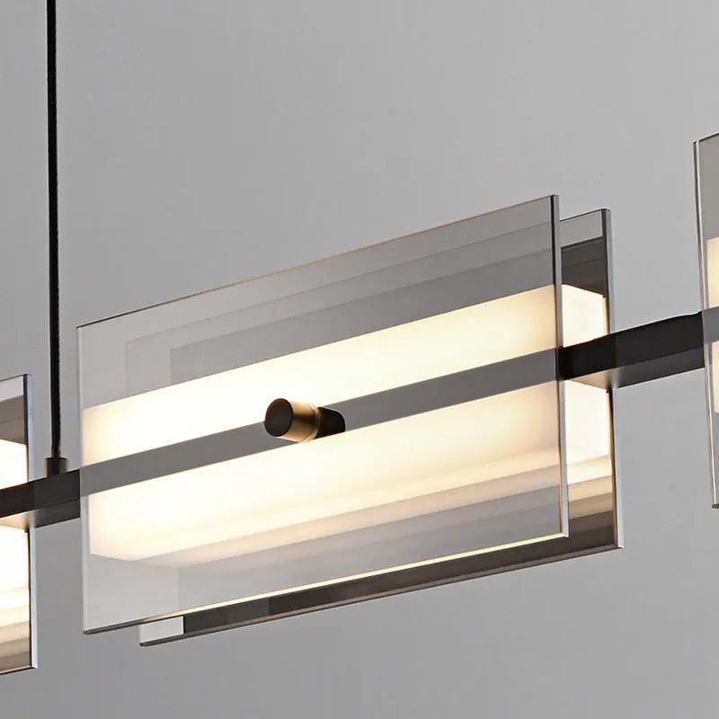 Arisha modern nordisk linjär pendellampa i metall/glas, mässing/svart