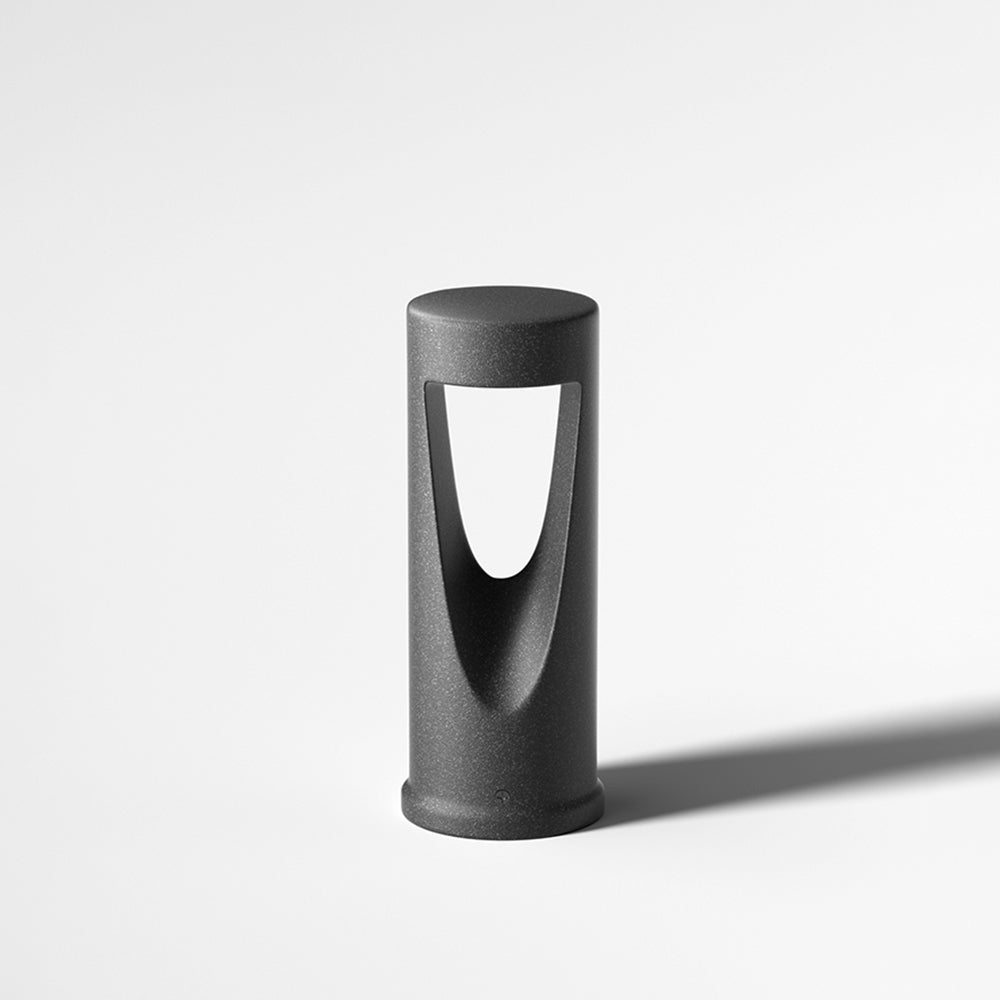 Ray moderne cylindrisk udendørs sti- og bedlampe i metal med hul design, sort