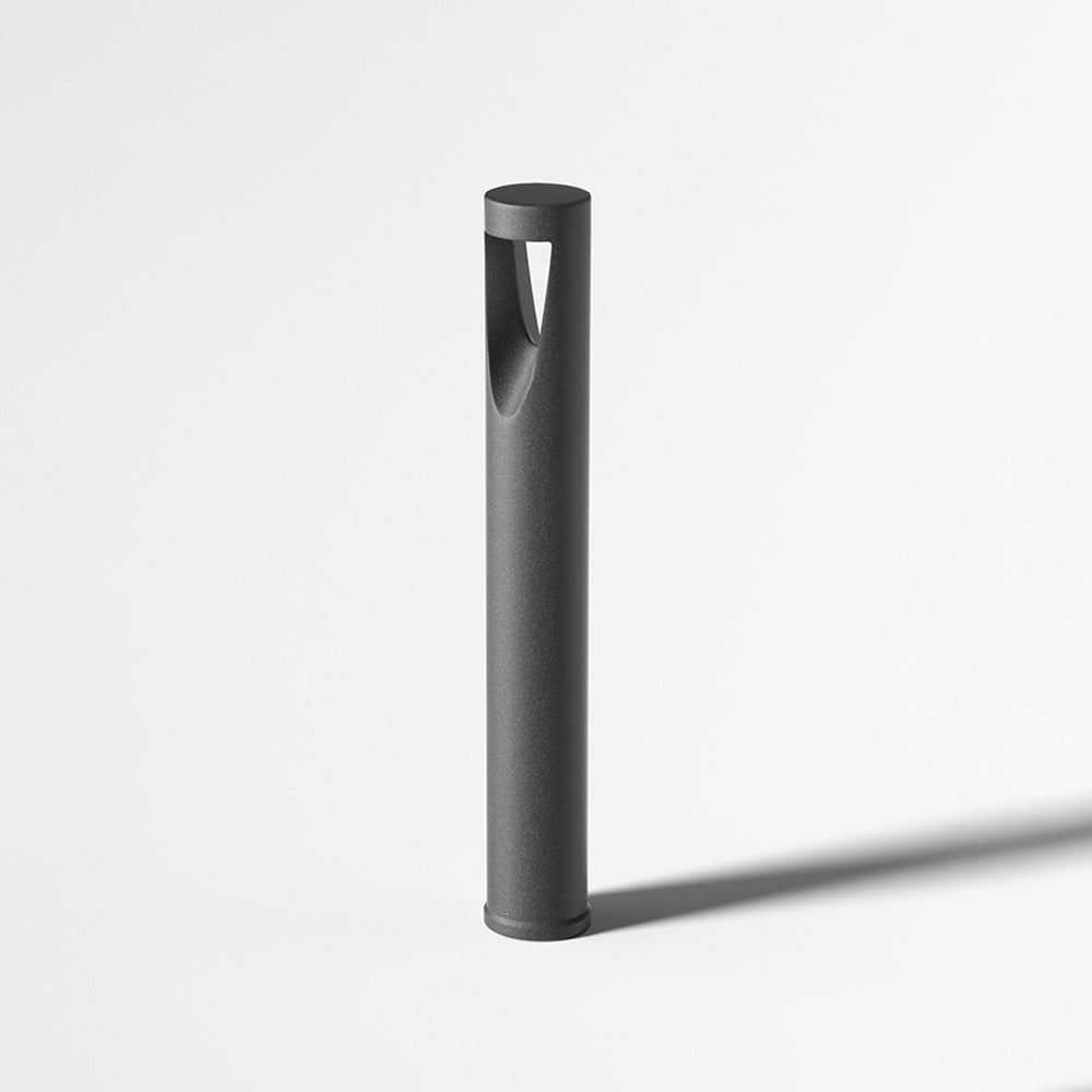 Ray moderne cylindrisk udendørs sti- og bedlampe i metal med hul design, sort